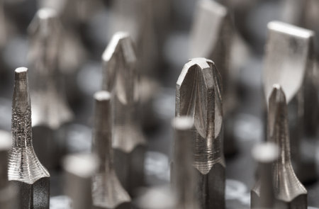A close up of many different sized screwdrivers. Some are small and some are large. The screwdrivers...