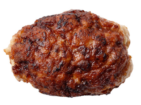 A piece of meat is brown and has a lot of fat. It is cooked and has a lot of seasoning on it