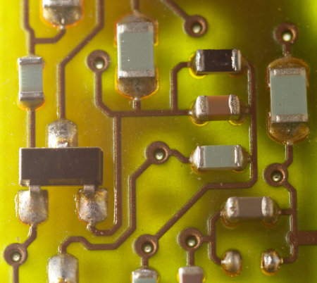 Close up of green electronic computer circuit board as background.