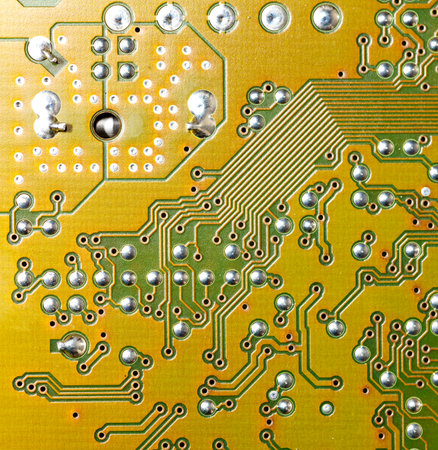 Close up of green electronic computer circuit board as background.