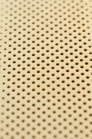 A pattern of black and white dots. The dots are evenly spaced and are all the same sizeの写真素材
