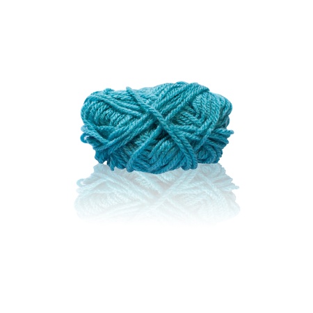 Bright thread for knitting isolated on white with reflectionの写真素材