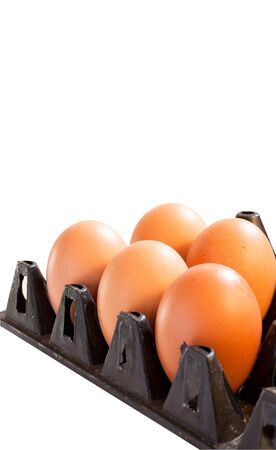 Eggs in black carton box on white backgroundの写真素材