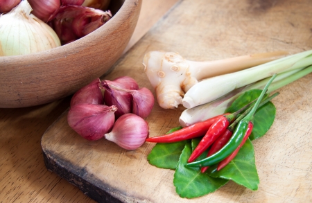 asian hot and spicy food ingredient with onions in wooden bowlの写真素材