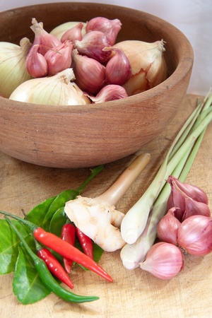 asian hot and spicy food ingredient with onions in wooden bowlの写真素材