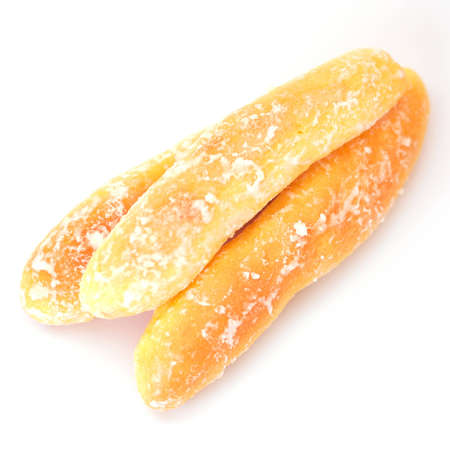 Breads with white sugar on top on white backgroundの写真素材