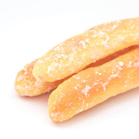 Breads with white sugar on top on white backgroundの写真素材