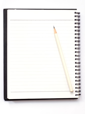 notebook and old white pencil isolated on white backgroundの写真素材