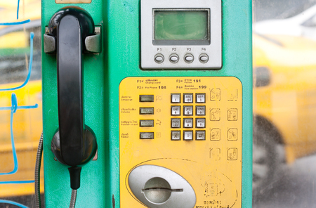 Old public coin-operated telephoneの写真素材