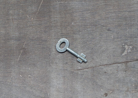 A key on wooden tableの写真素材