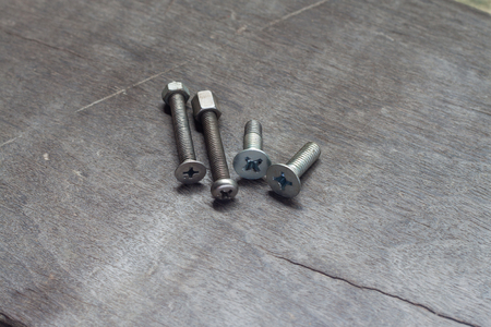 Screws on woodの写真素材