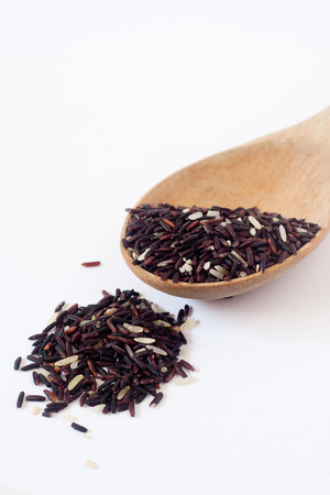 Closeup of raw purple Riceberry rice, it is a crossbred between Thai Hom Nil (black jasmine rice) and white Jasmine riceの写真素材