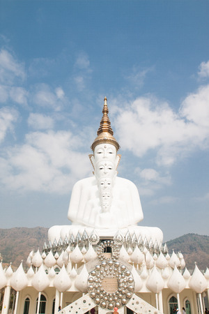Buddha statue with blue sky backgroundの写真素材