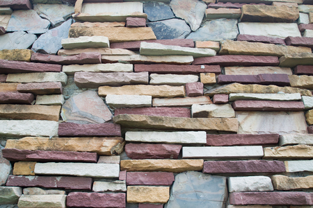 Background of stone wall textureの写真素材