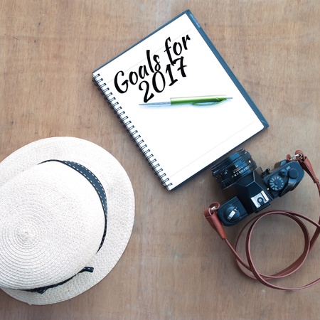 Goals for 2017 text on notebook with camera, travel conceptの素材