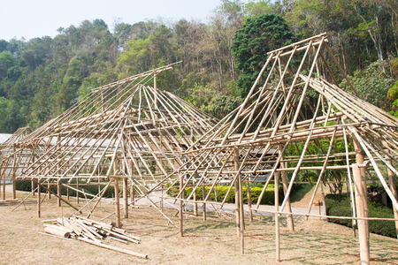 Under construction building with wood and bamboo in nature backgroundの写真素材