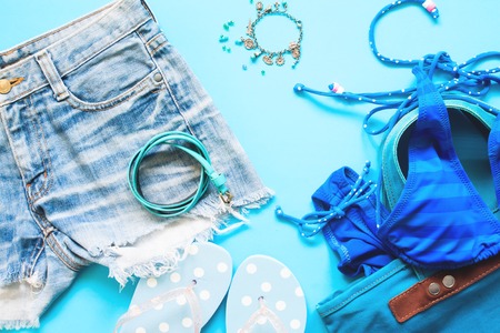 Spring and summer blue collection of girl accessories, Flat lay on blue  backgroundの写真素材