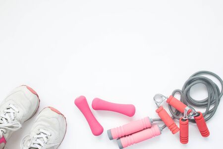 Overhead view of sport bra and sport equipments in pink color, healthy lifestyle concept with copy spaceの写真素材