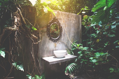 Vintage toilet in cottage country garden or tropical forestの写真素材