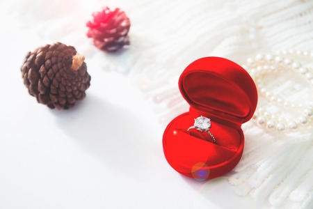 Wedding ring, Diamond ring in red box. Selective focus with copy spaceの写真素材