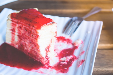 Strawberry sauce on crepe cakeの写真素材