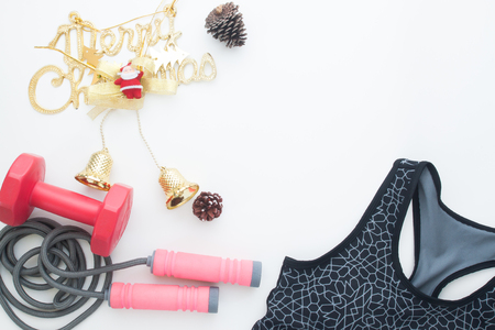 Overhead view of Christmas gifts and ornaments on white background, Healthy lifestyle conceptの写真素材