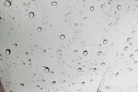 Rain drops on window, Season backgroundの写真素材