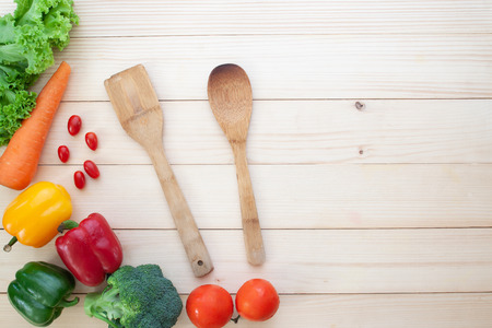 Top view of multicolour vegetables on wooden table, Healthy and wellbeing conceptの写真素材