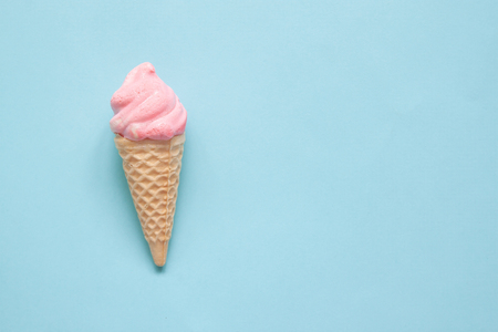Sweet cone on blue pastel colour backgroundの写真素材