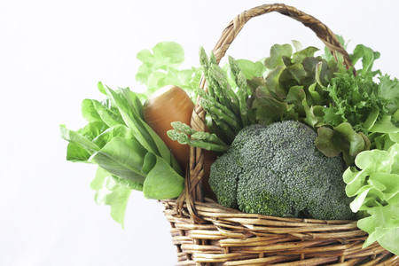 Close up vegetables in basket on white background, Healthy lifestyle conceptの写真素材