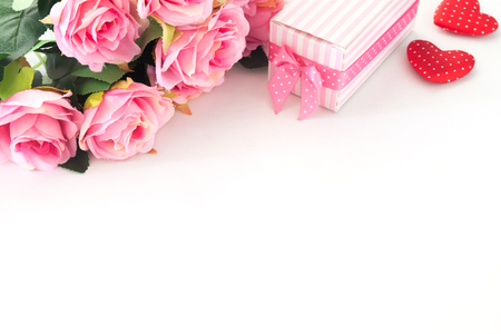 Pink roses, Gift box and heart on white backgroundの写真素材
