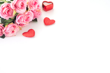 Pink roses and heart on white backgroundの写真素材
