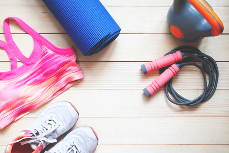 Flat lay sport and fitness items on wooden background. Healthy and Diet conceptの写真素材