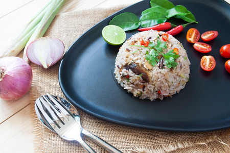 Thai mackerel fried rice with herbs. Traditional spicy fried rice. Close upの写真素材