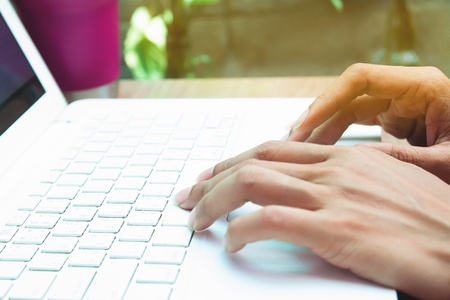 Woman using laptop computer. Online marketing conceptの写真素材