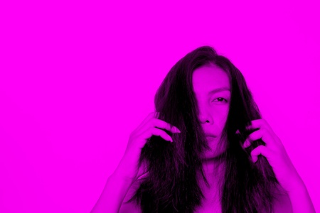Model fashion woman with pop purple colour filterの写真素材