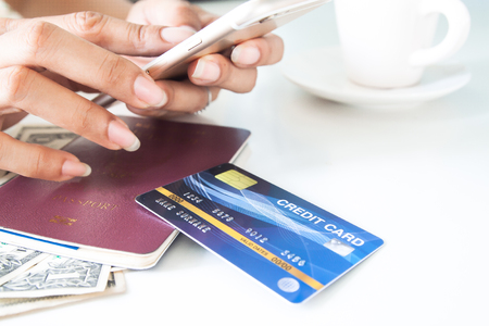 Woman hands using mobile phone and credit card. Shopping and lifestyle conceptの写真素材