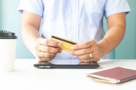 Man hand holding plastic credit card. E-payment, business and online paymentの写真素材