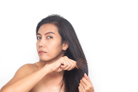 Beautiful of age 40+ Asian woman long black hair on white background. Health and surgery conceptの写真素材