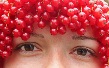 summertime, girl with red berries on her head