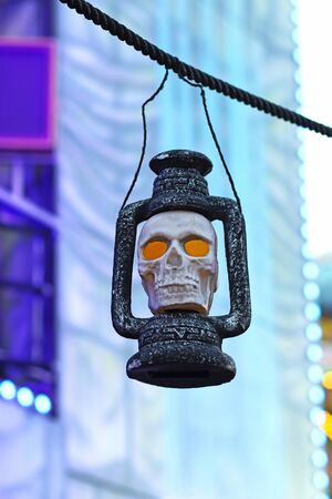 Shining eye holes in front of a ghost train at a fairの写真素材