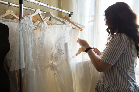 Dress designer making lace wedding dresses. Handmade.の写真素材