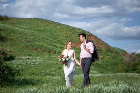 Bride and groom in the style of a Bohoの写真素材