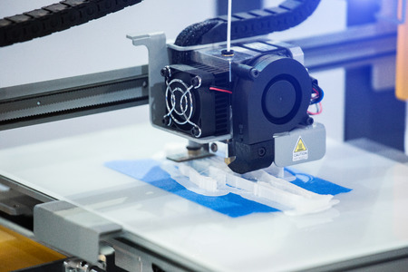 A 3d printer in the laboratory prints a structure from a polymer