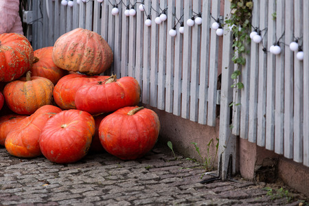 Autumn decoration with pumpkins on the street of a European cityの写真素材