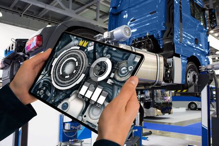 Repairing a truck with augmented realityの写真素材