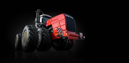 Tractor on a agricultural fieldの写真素材