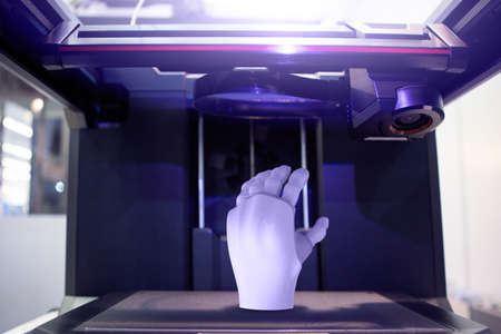 Artificial hand in 3D printerの写真素材