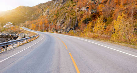 Autumn road in the mountainsの写真素材