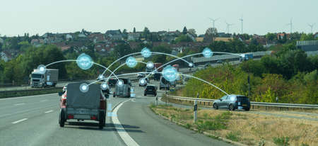 Vehicle to vehicle communication. Data exchange between cars.の写真素材